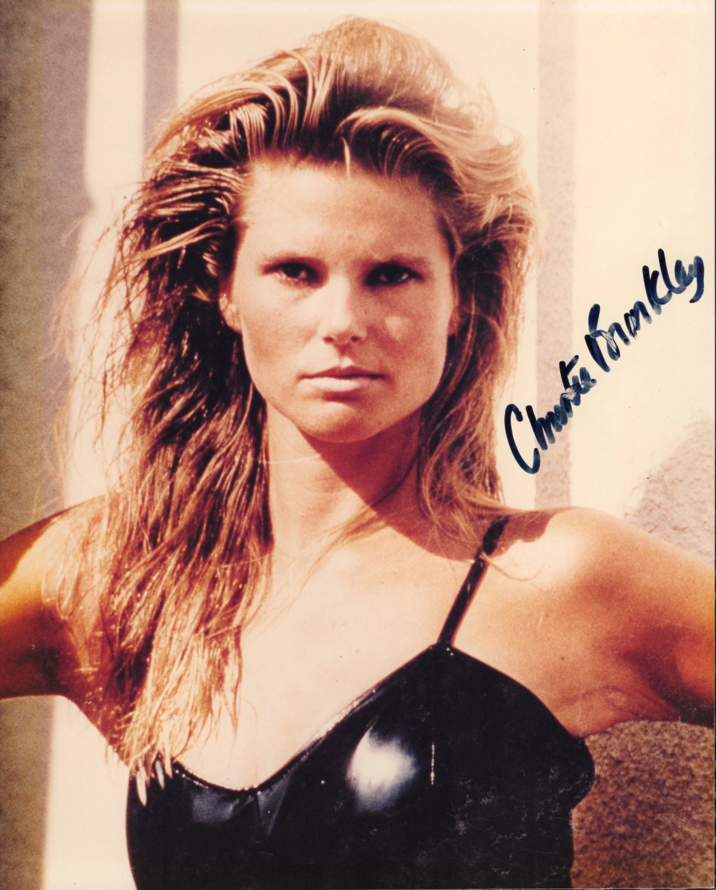 Christie Brinkley Signed Photo 8x10 in Black Swimsuit – Smeared Signature