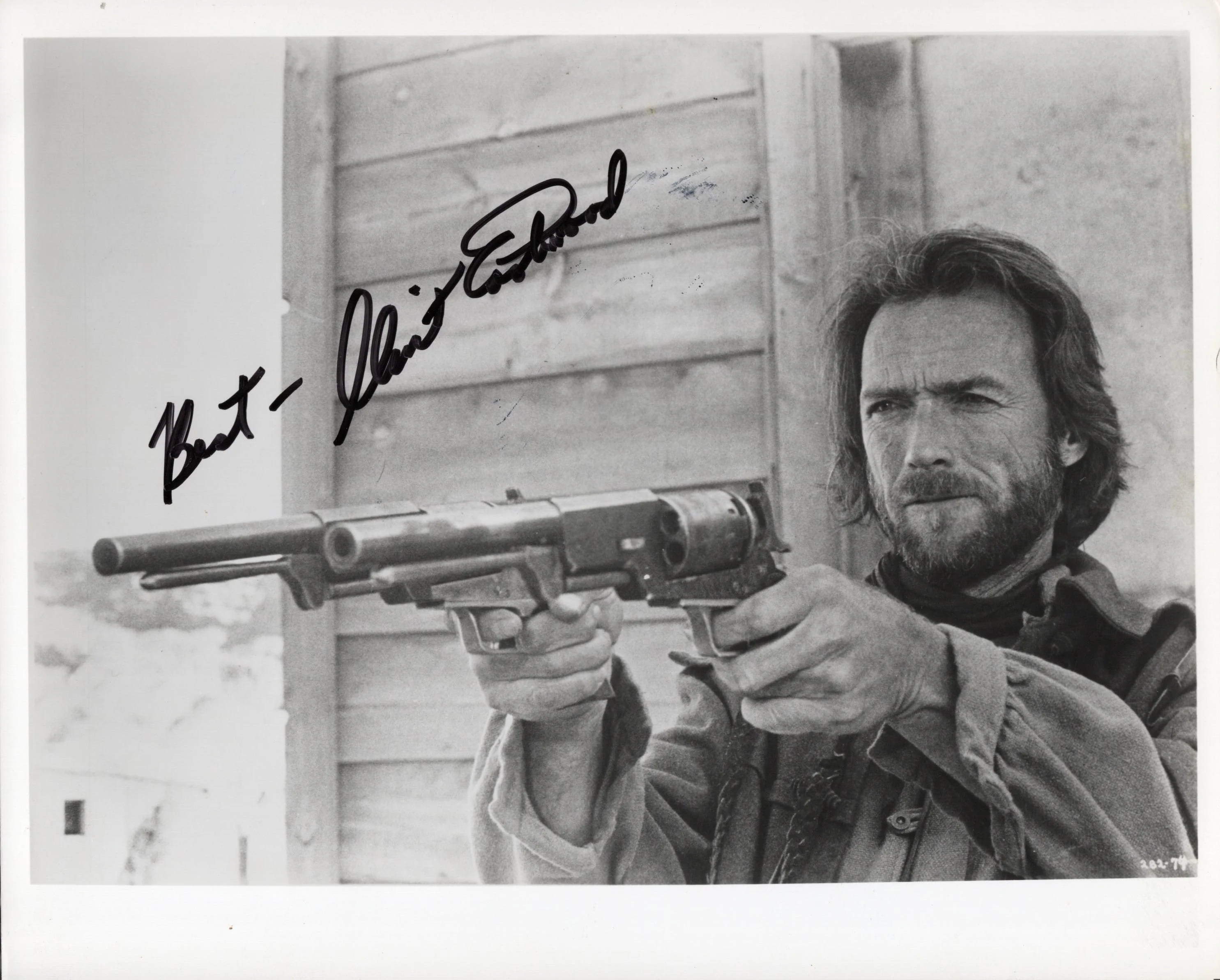 Clint Eastwood Signed Photo 8x10 – Pointing Two Pistols, Rare Collectible