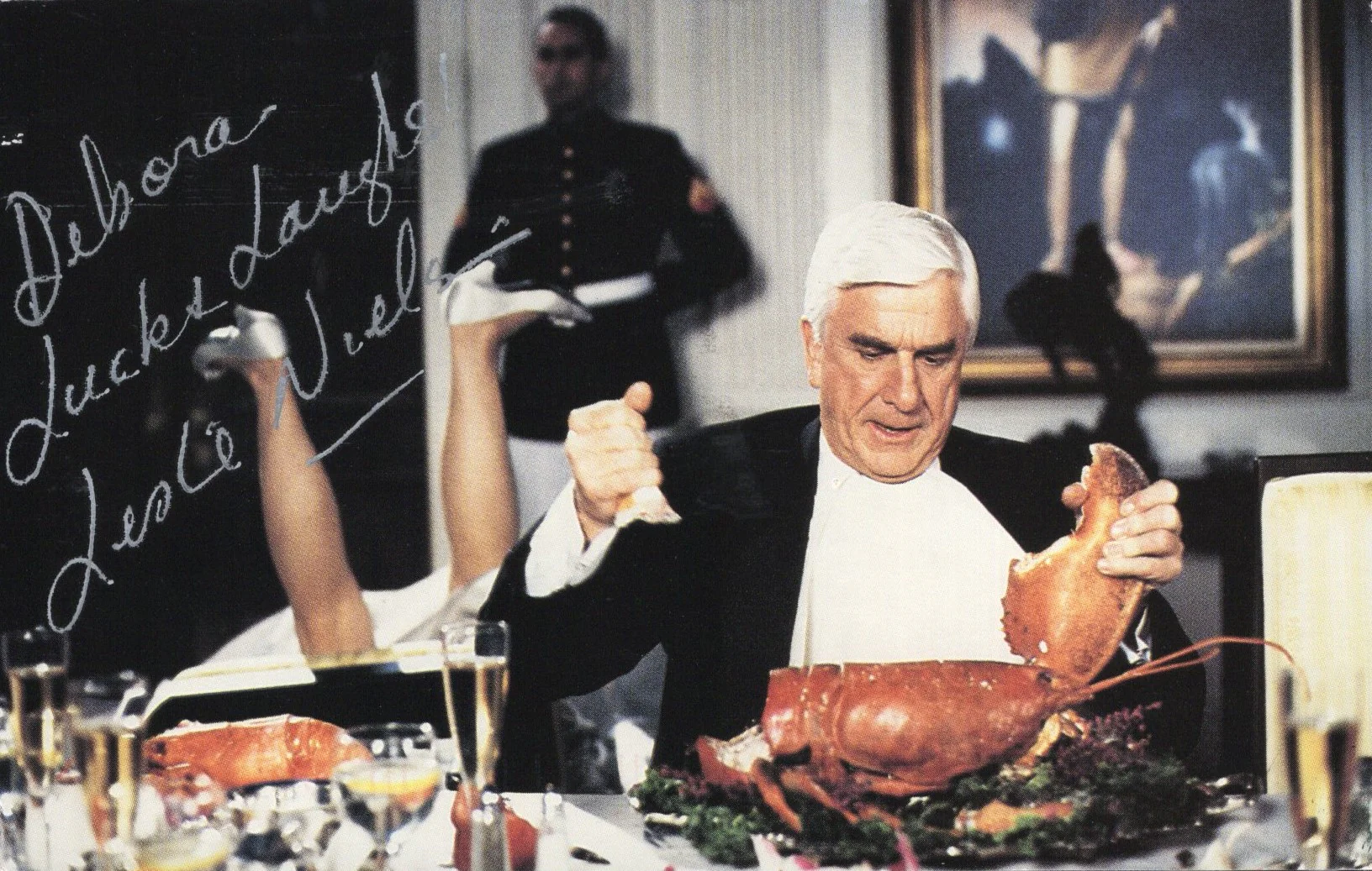 Leslie Nielsen Signed Photo 3.5x5.5 Personalized "Debora, Luck & Laughs", Leslie Nielsen Autograph in Naked Gun while Eating Lobster