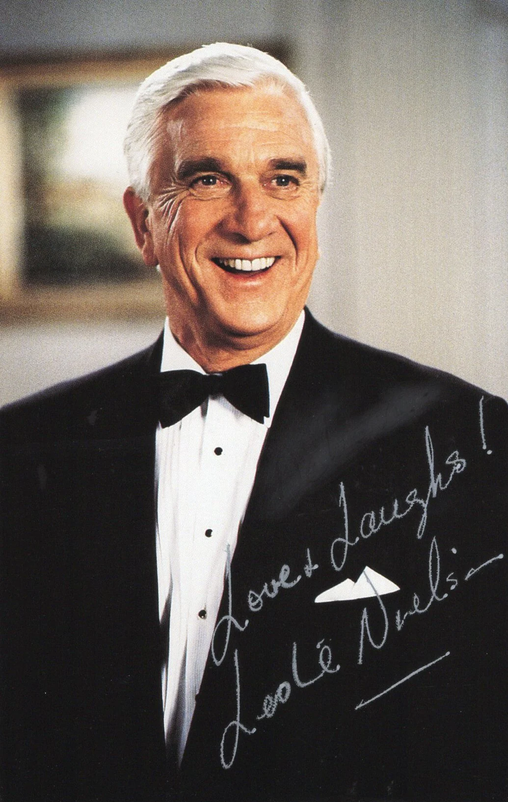 Leslie Nielsen Signed Photo 3.5x5.5 Personalized "Love & Laughs", Leslie Nielsen Autograph in Naked Gun while Wearing Tuxedo